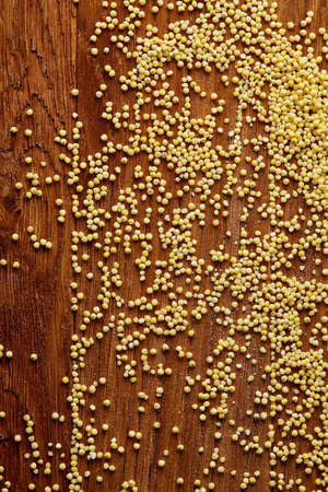 Lentils in a wooden bowl on rustic wooden background, top view, close-up, selective focus. Some copy space for your inscription. Organic protein. Nutrition vegan meal. Healthy food concept. Product for healthy eating and dieting.の写真素材