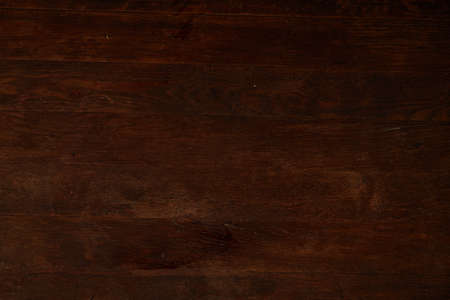 Wooden texture used as natural background, striped horizontal timber desk, close up. Wood texture, wooden plank grain background. Old table or floor, made of brown boards. Vintage background. Copy space for your text, inscription or picture.の写真素材