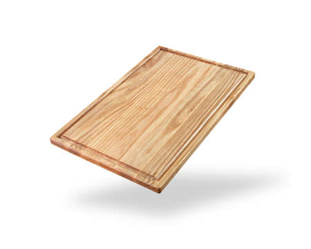 light wooden cutting board isolated on a whiteの写真素材