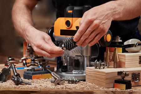 Milling wood in the joinery using manual mechanical cutters.の写真素材