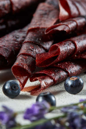 Fruit marshmallow. Berry pastille on light background. Pastille fruit rollsの写真素材