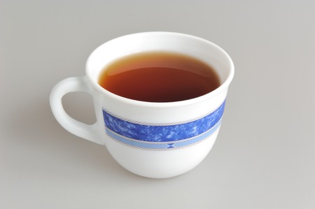 A cup of tea on grey の写真素材