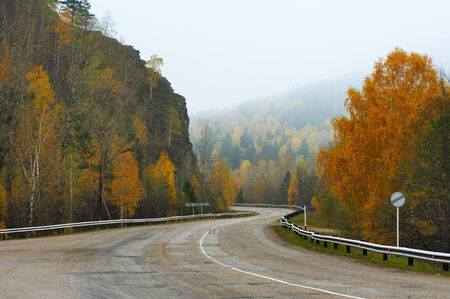 Mountain winding road in the fallの写真素材