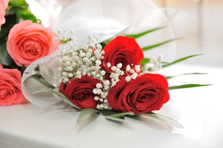 Bouquet three of red roses decoratedの写真素材