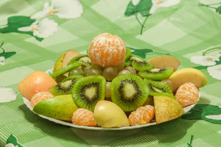 Sliced fruit on a plateの写真素材