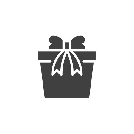 Gift box with bow ribbon vector icon. filled flat sign for mobile concept and web design. Surprise box glyph icon. Symbol, logo illustration. Vector graphicsのイラスト素材