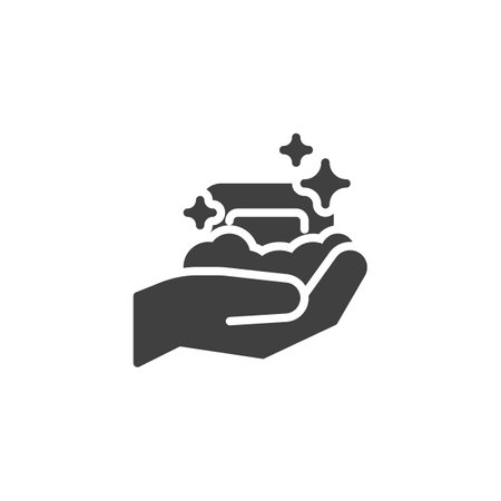 Hand with bar of soap and foam vector icon. filled flat sign for mobile concept and web design. Washing hands glyph icon. Hygiene symbol, logo illustration. Vector graphicsのイラスト素材