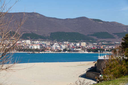Mountain views and sandy beach at marine Bayの写真素材