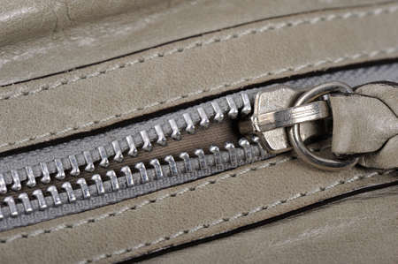 Gray Leather zipper closeup shallow DOFの写真素材