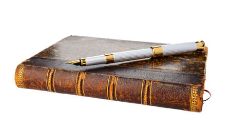 Fountain pen and old book, shallow DOF