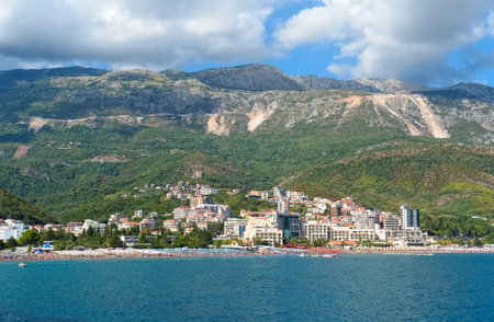 Montenegro, Becici - August 12, 2017: View from the sea to the beaches and hotels of the Budva Riviera in the resort town of Beciciのeditorial素材