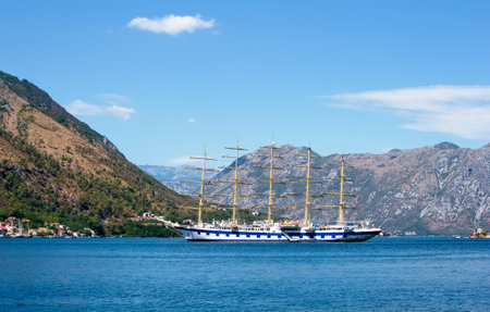 Montenegro, Kotor - August 13, 2017: View of a beautiful sailboat cruise (barquentine) Star Clipper in the Kotor Bay, landscape, Adriatic Seaのeditorial素材