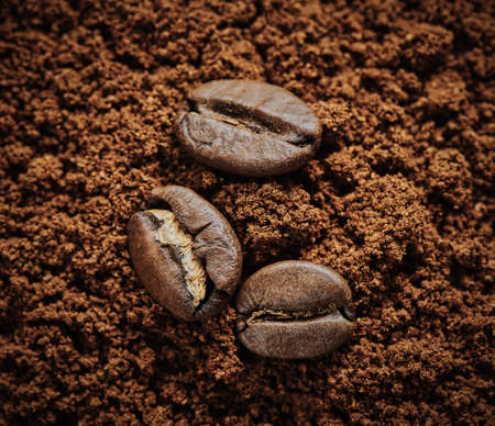 Coffee beans and freshly ground coffee, macro, stylized
