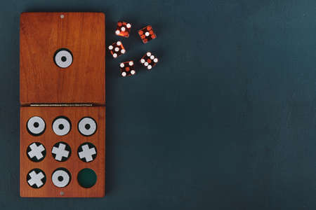 Tic Tac Toe in wooden box and dice