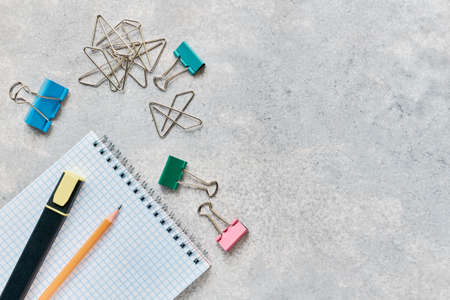 School and office stationery on a gray background with copy spaceの写真素材