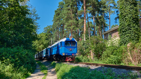 Going childrens railroad train in Zhukovsky town near Moscow, landmark: Zhukovsky, Russia - July 06, 2021のeditorial素材