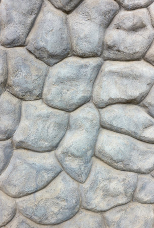 Texture of a stone wall for background, cobblestone masonryの写真素材