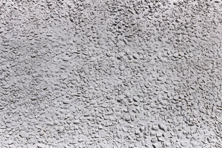 Stone concrete wall of gray color, the background, close upの写真素材