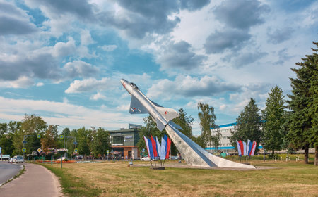 Cityscape, view of the symbol of the city of Zhukovsky monument fighter jet MIG-21, landmark: Zhukovsky, Russia - July 21, 2021のeditorial素材
