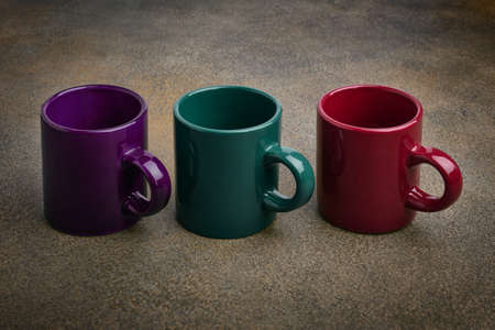 Colored ceramic mugs close upの写真素材