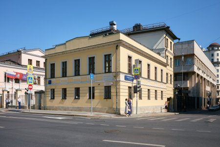 Crossroads of Bolshaya Polyanka Street and Pogorelsky Lane, an old non-residential building built in 1870, cityscape: Moscow, Russia - August 17, 2022のeditorial素材