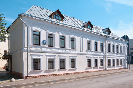 An old building, now an administrative building in the style of neoclassicism built in the 19th century, view from Dobrovolchesky Lane, landmark: Moscow, Russia - August 14, 2022のeditorial素材