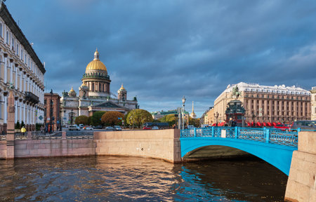 Blue Bridge over the Fontanka River, 1842-1844, overlooking St. Isaacs Cathedral and the Astoria Hotel, landmark: St. Petersburg, Russia - October 07, 2022のeditorial素材