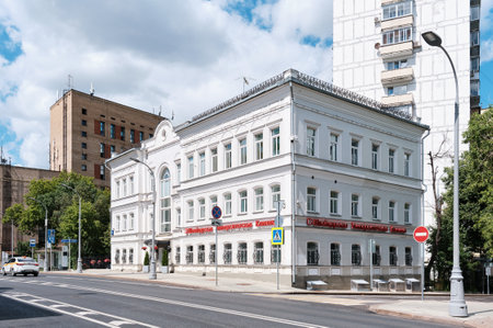 An old three storey house built in 1860 on Nikoloyamskaya Street, currently houses the Swiss University Clinic: Moscow, Russia - July 29, 2022のeditorial素材