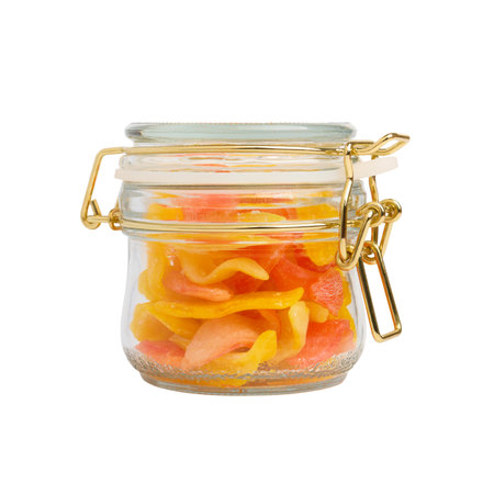 Glass jar of fruit lollipops isolated on white background, close-upの写真素材