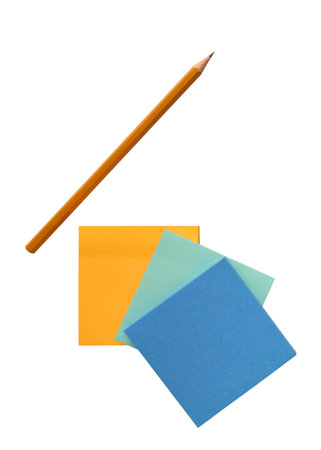 A simple pencil and colorful paper notes isolated on a white background close up