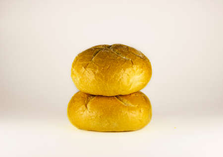 Buns on a white background. Close up. Fresh homemade bread on white background.の写真素材