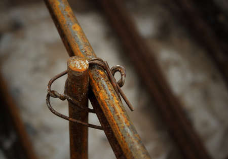 Reinforcing steel rod for construction, construction work.Reinforcing steel rods with wire rod are used on the construction site.The use of steel wire for fixing steel rods with wire rods.の写真素材