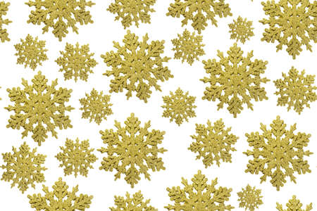 Golden Christmas snowflakes pattern isolated on white backgroundの写真素材
