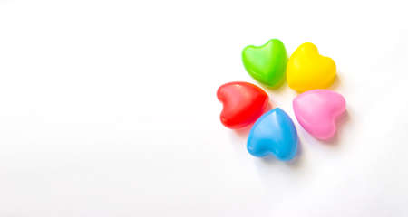 Five multicolored hearts on a white background. Unified Friendship Concept. Love and multi ethnic...