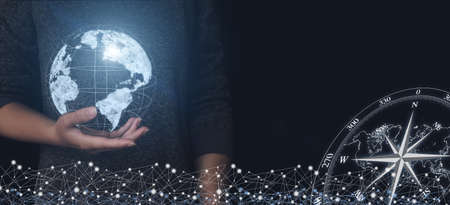 Hand hold the virtual hologram earth on hand, the concept of communication network, traveling,...