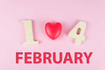 Happy Valentines Day Concept. Close-Up Of Wooden Number 14 and text FEBRUARY. Top view. Flat layの写真素材