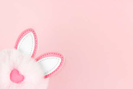 Bunny ears pink background. Spring holiday design