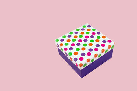 Gift box over pink background. For christmas, new year and valentine concept. copy space.