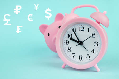 Global currency exchange concept Pink piggy bank in the shape of pig with digital hologram hologram...