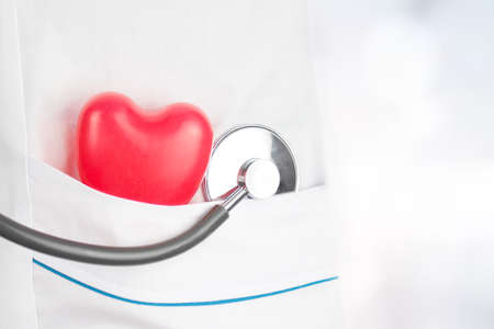 Cardiology concept. Health care and patient, Failure and Diseases concept. Red heart shape and...