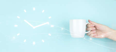 Girl hand hold morning coffee cup with clock sign Icon on blue background. time management project...