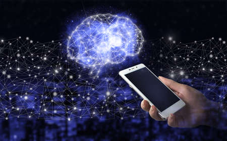 Digital Brain Artificial intelligence. Hand hold white smartphone with digital hologram Brain sign...