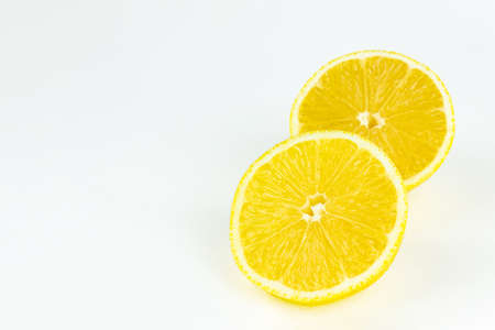 Fresh yellow Lemon slice cuted use for top view backgroundの写真素材