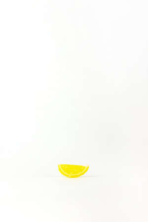 Lemon fruit Jelly marmalade on the white. Dessert marmalade in the form of lemon slices. Food minimal conceptの写真素材