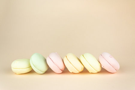 Colorful marshmallows looks like french macarons background, close up, colorful almond cookies,...