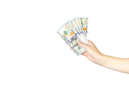 Hand holding money on white background. Hand giving money - United States Dollars or USD