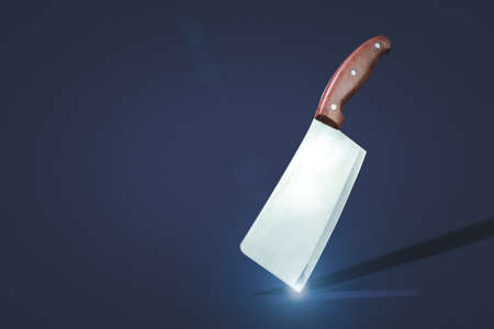 Kitchen knife balanced on its end on dark background. creative. Chef, restaurant or kitchen concept