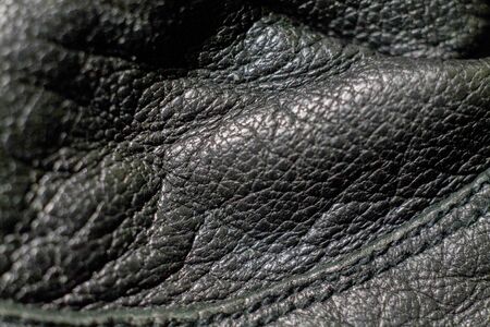 Shining wrinkeled black leatherの写真素材