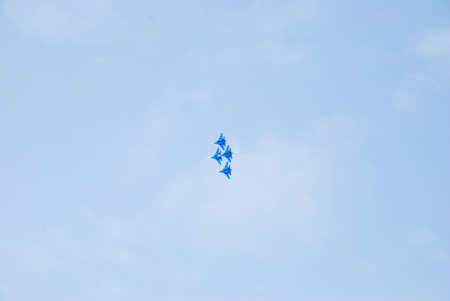 Omsk Russia - 19 March 2016: Performance of aerobatic team Russian Knights at the air show