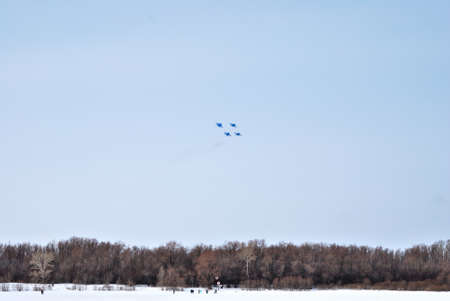 Omsk Russia - 19 March 2016: Performance of aerobatic team Russian Knights at the air showのeditorial素材